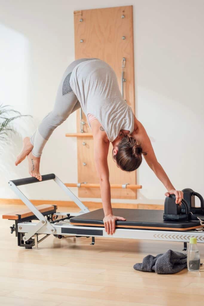 active hobbies to make friends woman doing pilates